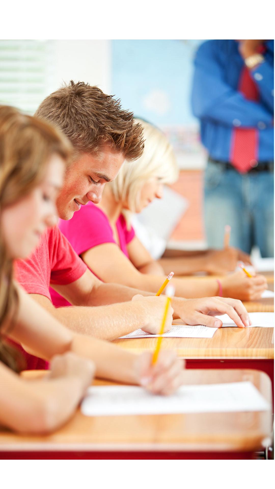 Students in class writing