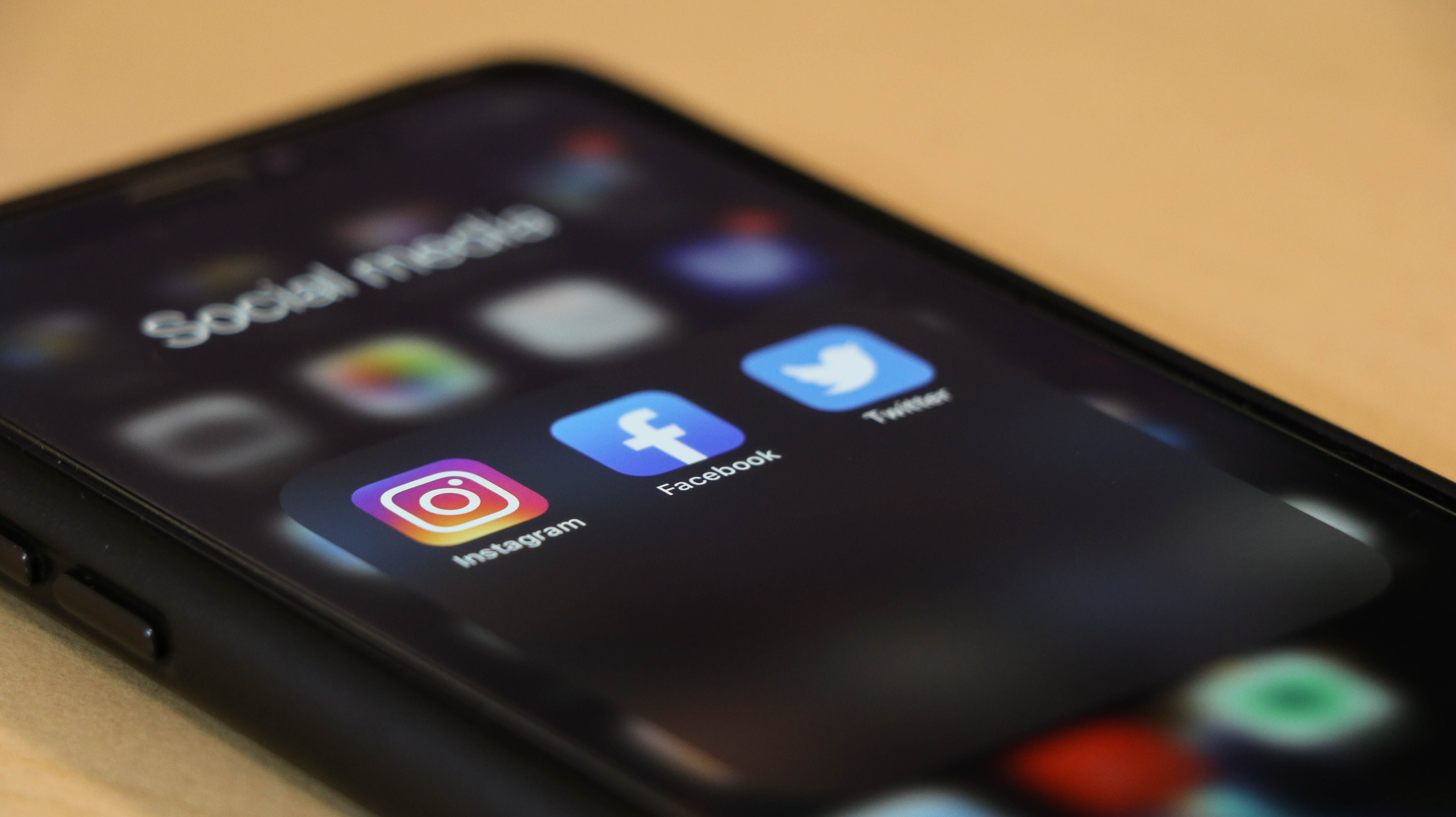 Social media apps on an iPhone.