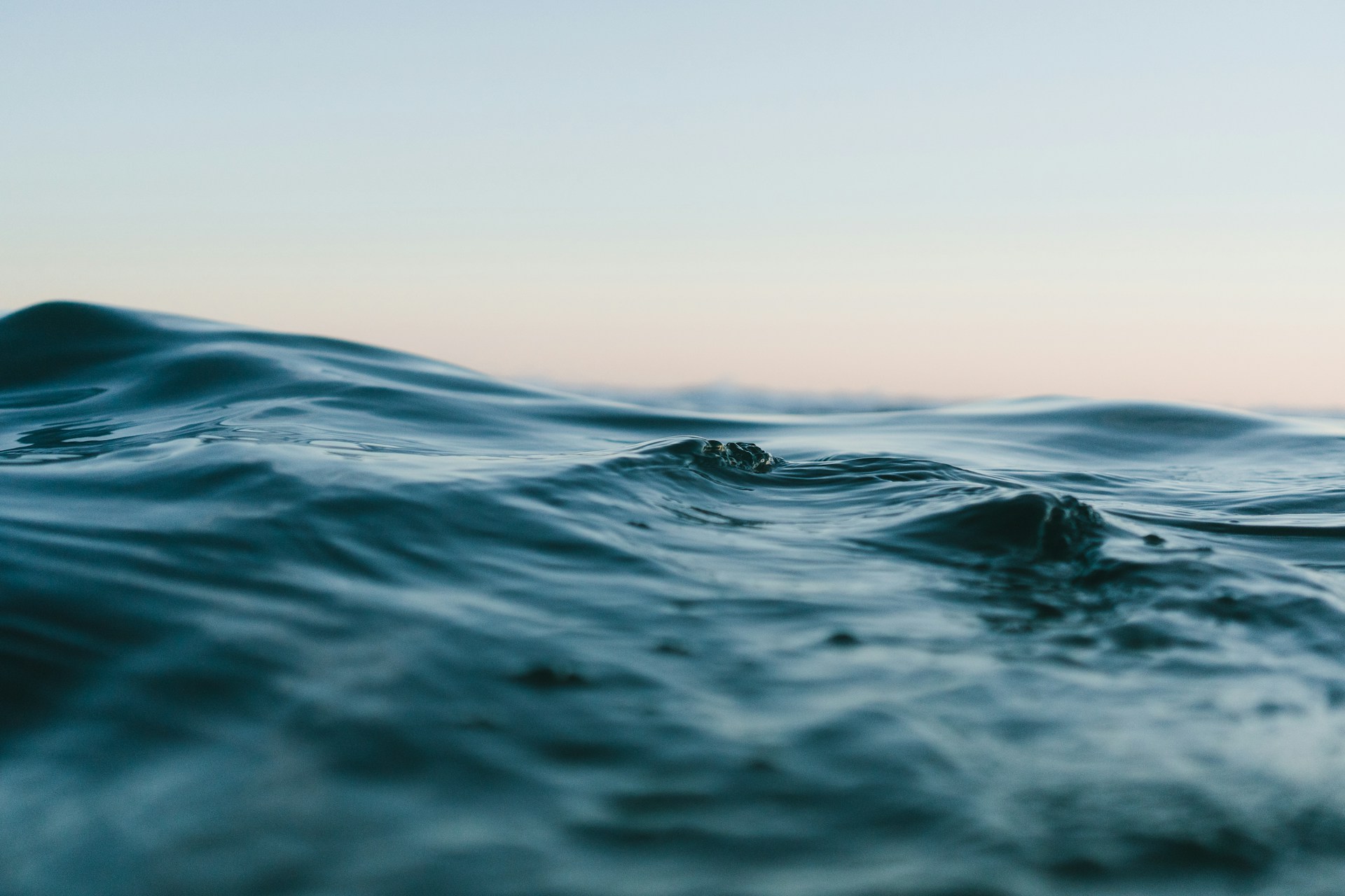Close up of body of water, with sky in the background