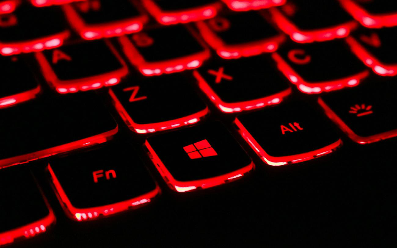 Close-up of a keyboard with red backlight