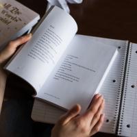 Person studying poetry